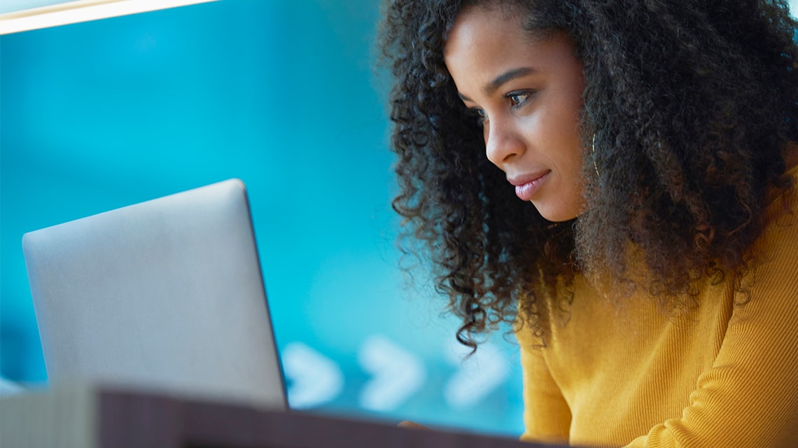 Student looking at laptop screen