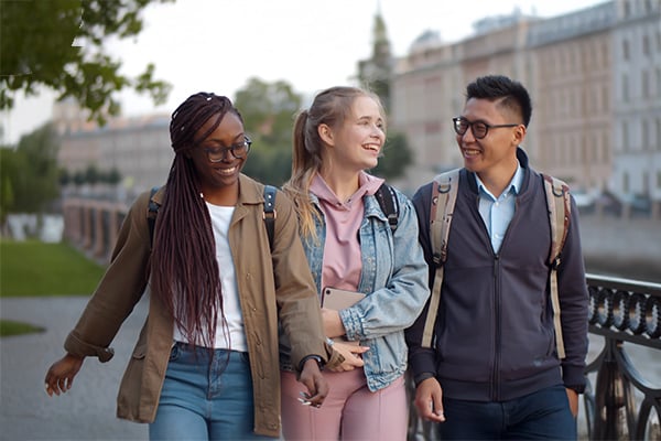 Students laughing walking